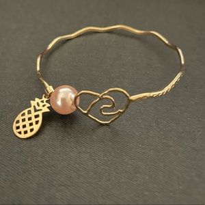 Hamilton gold bangle with heart shape